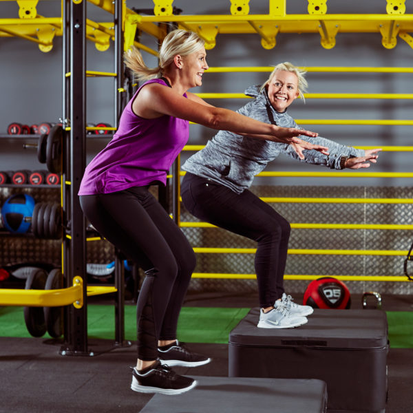 Photo of two women exercising